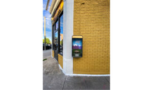 Former phone reflects the day in Somerville. Photo by Jason Pramas. Copyright 2022 Jason Pramas.