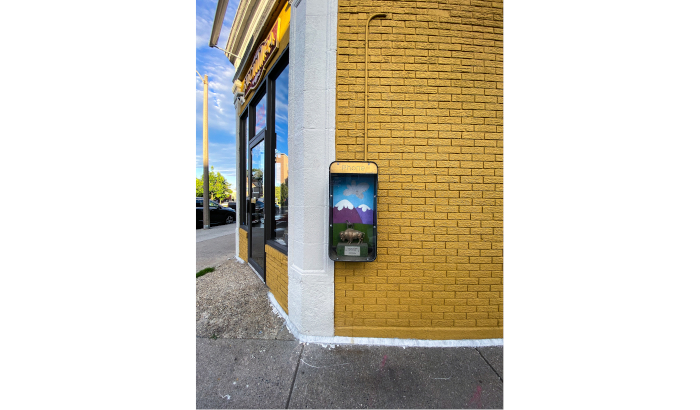 Former phone reflects the day in Somerville. Photo by Jason Pramas. Copyright 2022 Jason Pramas.